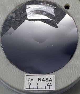Silicon wafer with mirror finish, the base material for memory chips like those made by Micron
